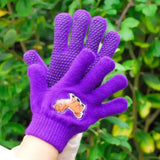 Purple rhinegold children’s pony grooming gloves with textured dotted fingertips and cartoon dog patch on the palm