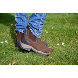 Brown leather Rhinegold Columbus Short Country Boot on grassy ground with elastic sides