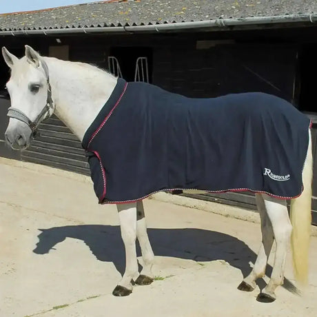 Navy blue rhinegold comfey collar fleece rug with pink trim white stitching suede fleece rug for horses