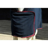 Navy blue rhinegold comfey collar suede fleece rug with red and white stitched trim for horse comfort