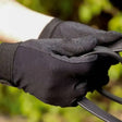 Black rhinegold cotton pimple palm gloves with textured grip panels and reinforced stitching for lightweight use