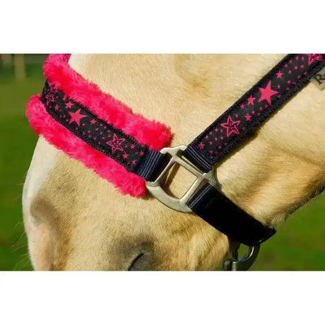 Pink and black star-patterned rhinegold crystal star headcollar with plush pink lining and trigger clip throat detail