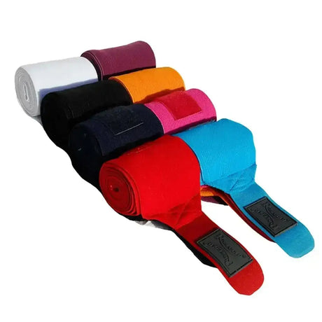 A set of colorful rhinegold elasticated bandages in various colors for protecting a horse’s legs whilst training