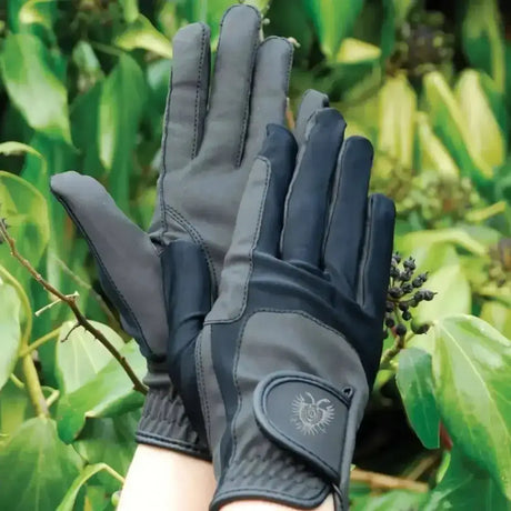 Black and gray rhinegold elite stretch riding gloves showing back with subtle logo patch on wrist for riding gear