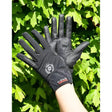 Black rhinegold fine mesh stretch riding gloves with textured palm and white logo on back of hand