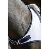 White horse blanket from rhinegold fixed chest mesh ride-on rug with navy trim gold buckle and soft fleece collar