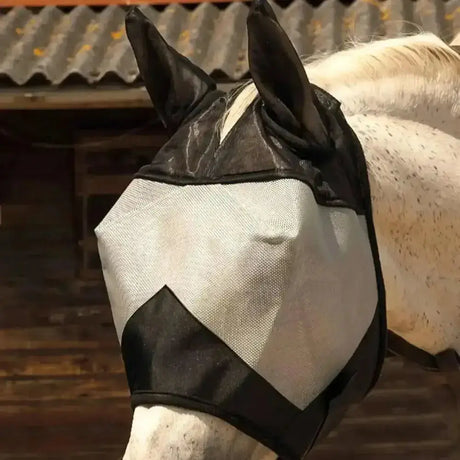 Black and silver mesh rhinegold fly mask with ears featuring soft fleece binding and wide touch tape edges