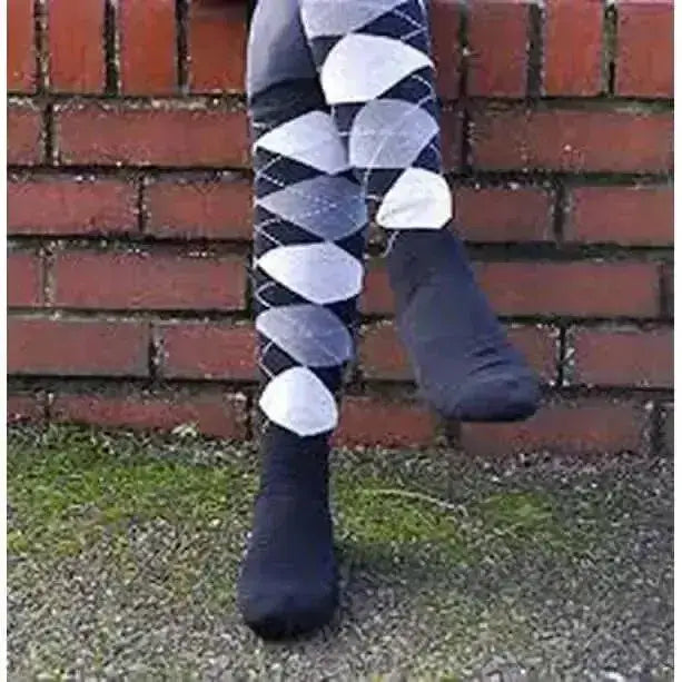 Black argyle patterned rhinegold fully cushioned sole riding socks worn over black socks for extra comfort