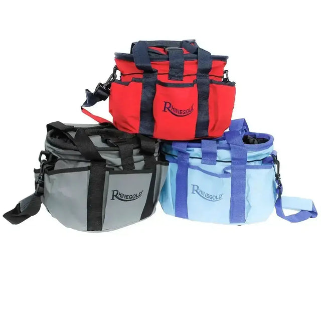 Red gray and light blue rhinegold grooming bags with black straps and elasticated drawstring closure for horse tack boxes