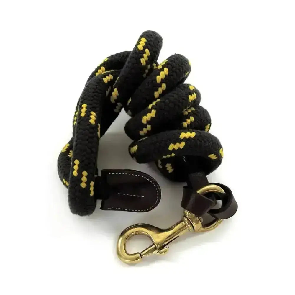 Black lead rope with yellow diamond accents, dark brown leather loop, and brass hardware from rhinegold heavy duty cotton lead rope