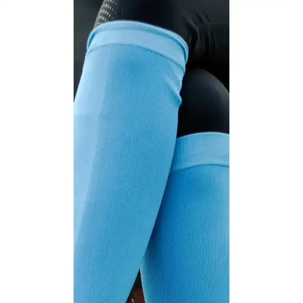 Light blue ribbed compression leggings with a snug fit for junior performance riding by rhinegold junior performance