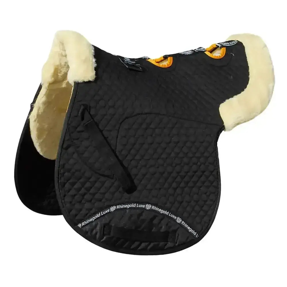 Black quilted rhinegold luxe fur vented numnah with cream fleece lining and orange girth strap accents for general purpose fit