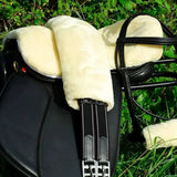 Black leather rhinegold luxe girth with cream sheepskin fur pile girth sleeve for extra comfort