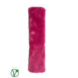 A vibrant magenta rhinegold luxe noseband cover with soft fuzzy fur pile for a noseband cover luxury look