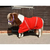 Red rhinegold mini fleece horse rug with white trim and adjustable straps for comfortable cosy fleece warmth