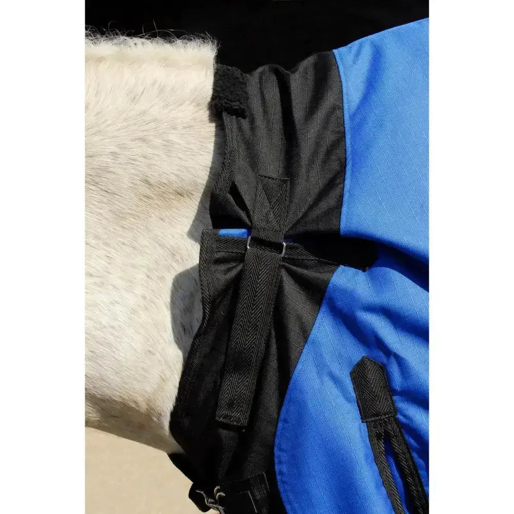 Blue and black rhinegold phoenix outdoor horse blanket with textured weave fabric and easily adjustable neckline