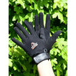 Black rhinegold polartec suede palm riding gloves with reinforced fabric and branded wrist strap showing back side