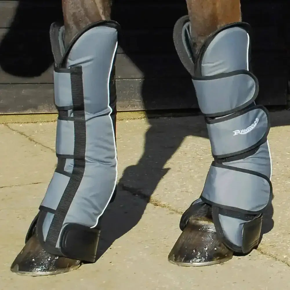 Gray and black padded rhinegold ripstop long travel boots with reflective trim and adjustable straps for secure fit