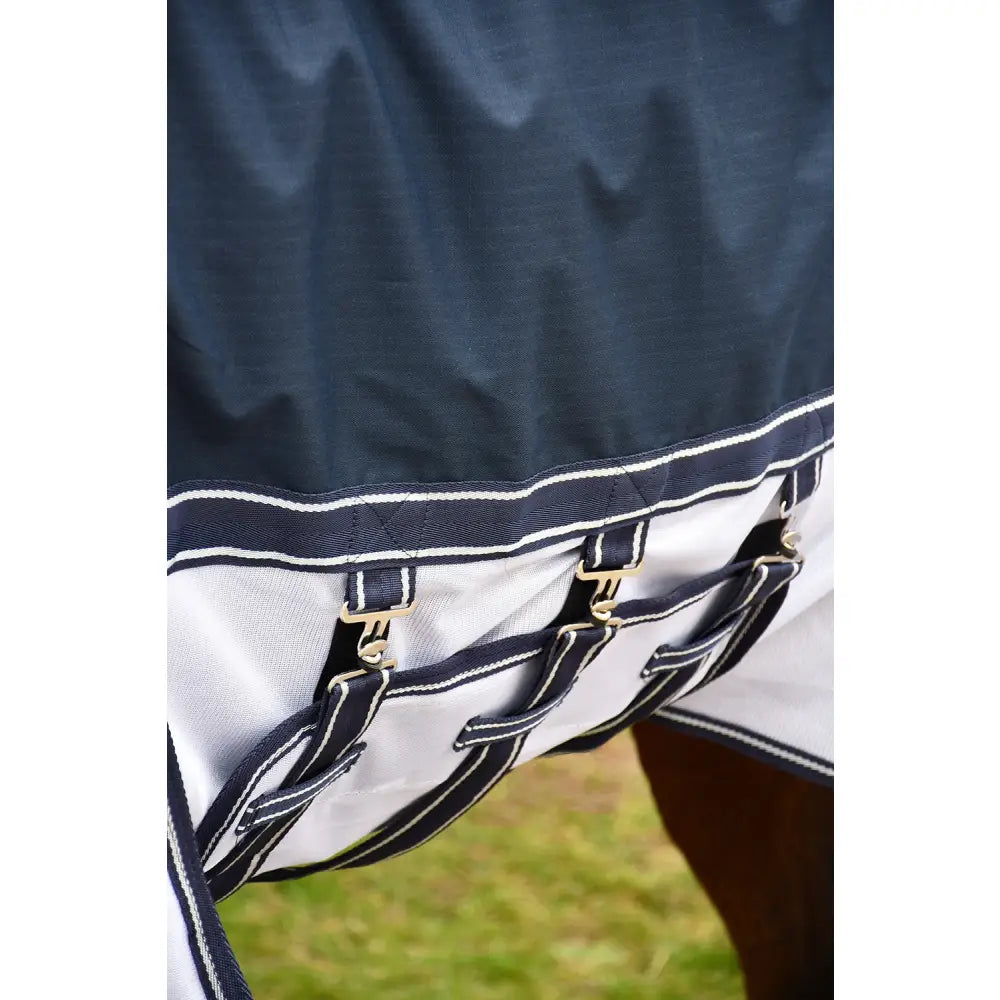 Navy and white striped rhinegold sierra topline fly rug with black straps and gold-toned buckles in denier waterproof material