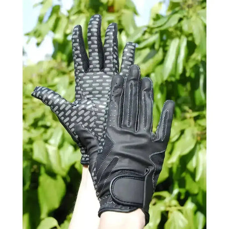 Black rhinegold silicone grip riding gloves with gray textured synthetic stretch grip and velcro strap closure