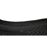 Black Nike Air Max 90 sneaker with mesh upper and textured rubber sole shown alongside Rhinegold silicone memory foam saddle pad