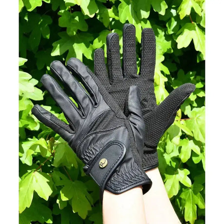 Black leather rhinegold super grip stretch riding gloves with textured grip panels and gold-tone logo on wrist strap