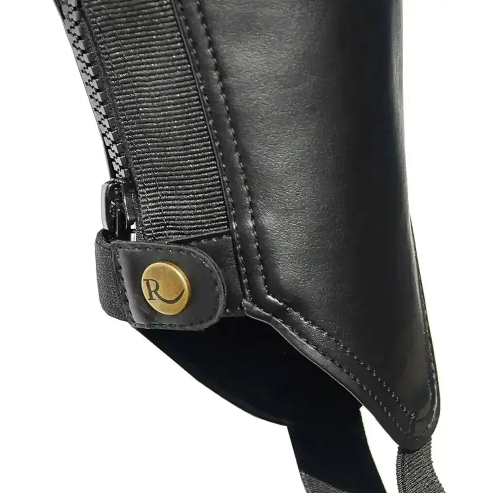 Black leather rhinegold synthetic gaiters with gold-tone r logo button and zipper closure padded synthetic gaiter