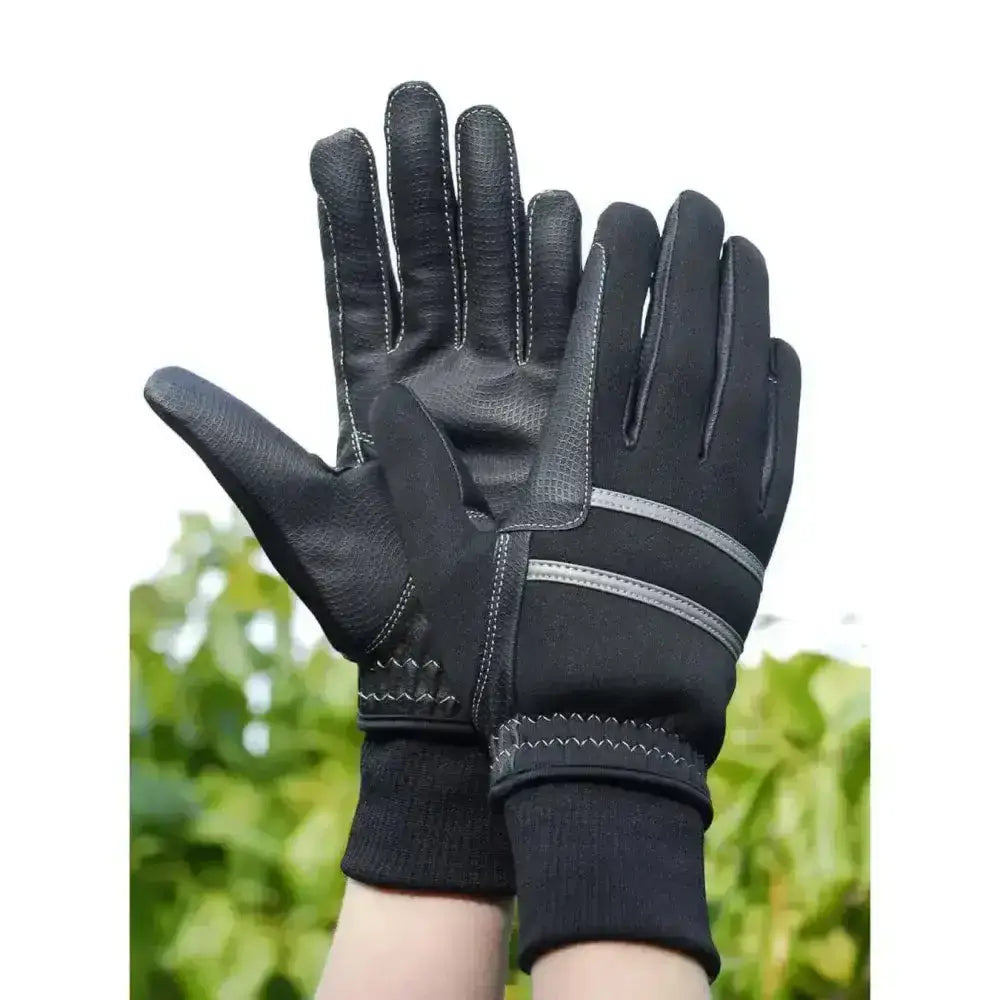 Back of black Rhinegold thinsulate lined winter riding gloves with reinforced stitching and reflective gray wrist stripes
