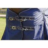 Navy blue rhinegold turnout rugs arizona 100g light with black leather straps and gold metal buckles for horses
