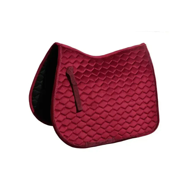 Red quilted rhinegold velvet hexagon gp saddle pad with black interior and fabric girth placement straps