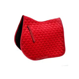 Red quilted rhinegold velvet hexagon gp saddle pad with black underside and girth placement straps visible on side