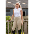 Beige rhinegold vogue full seat performance tights with a high waistband and subtle side pockets for riding use