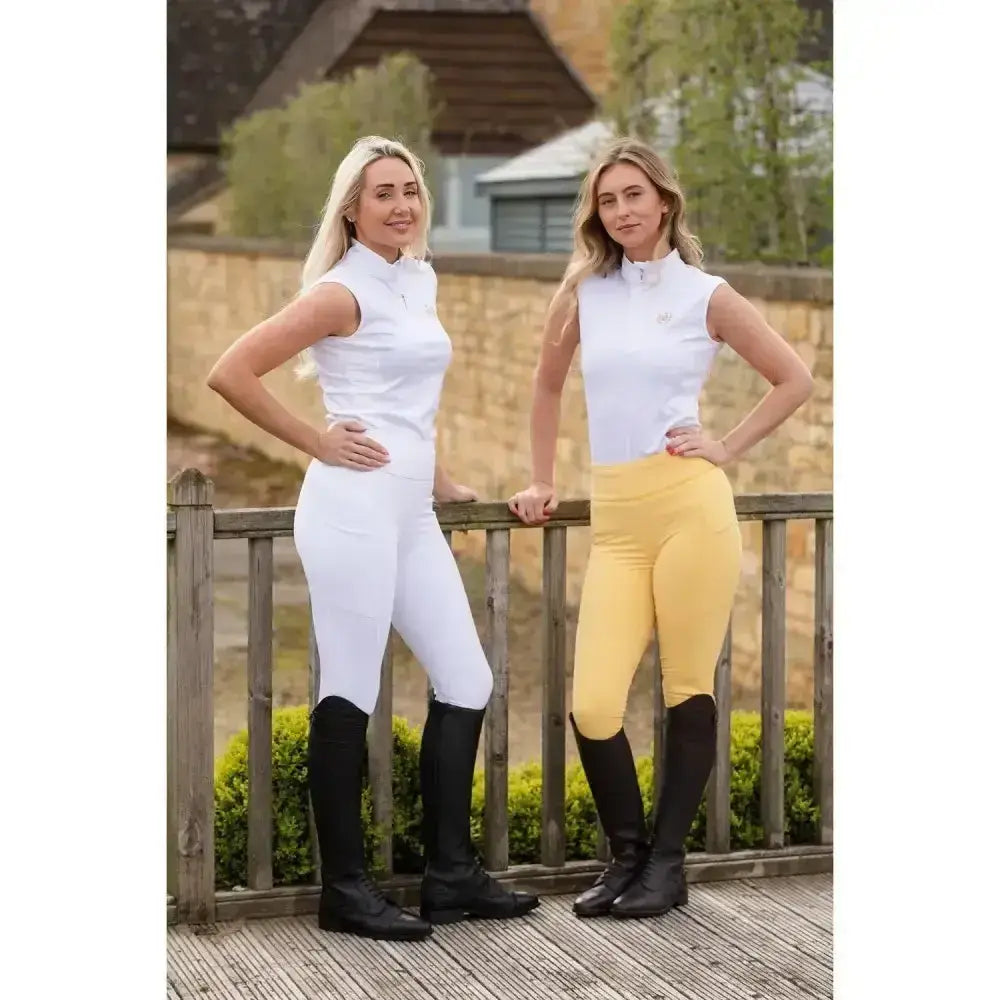 White and yellow rhinegold vogue seat performance tights with black boots fully lined riding tights front view