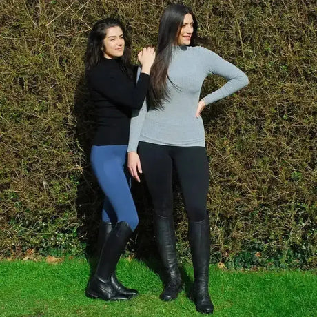 Black leather riding boots with sleek polished finish shown with rhinegold warmer weight riding tights for comfort and style