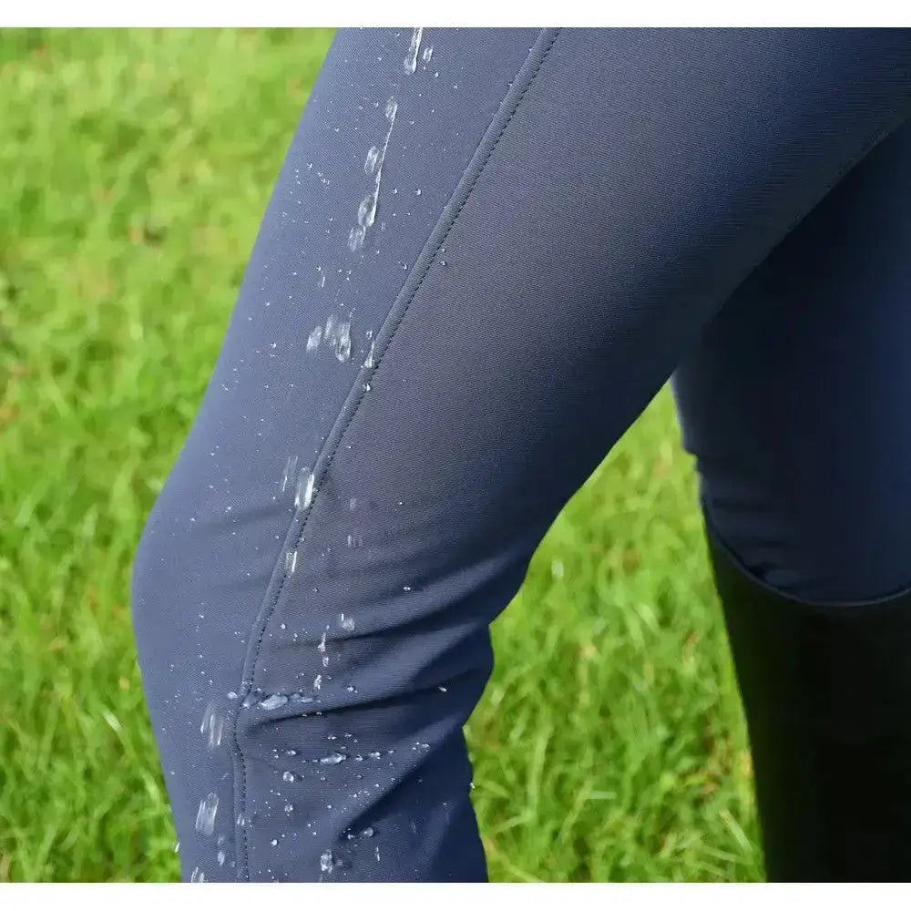 Dark navy blue rhinegold waterproof breeches with smooth stretchy fabric and subtle seam detailing perfect for active wear