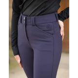 Navy blue rhinegold waterproof breeches with a fitted silhouette high waistband and subtle embroidered logo on front pocket