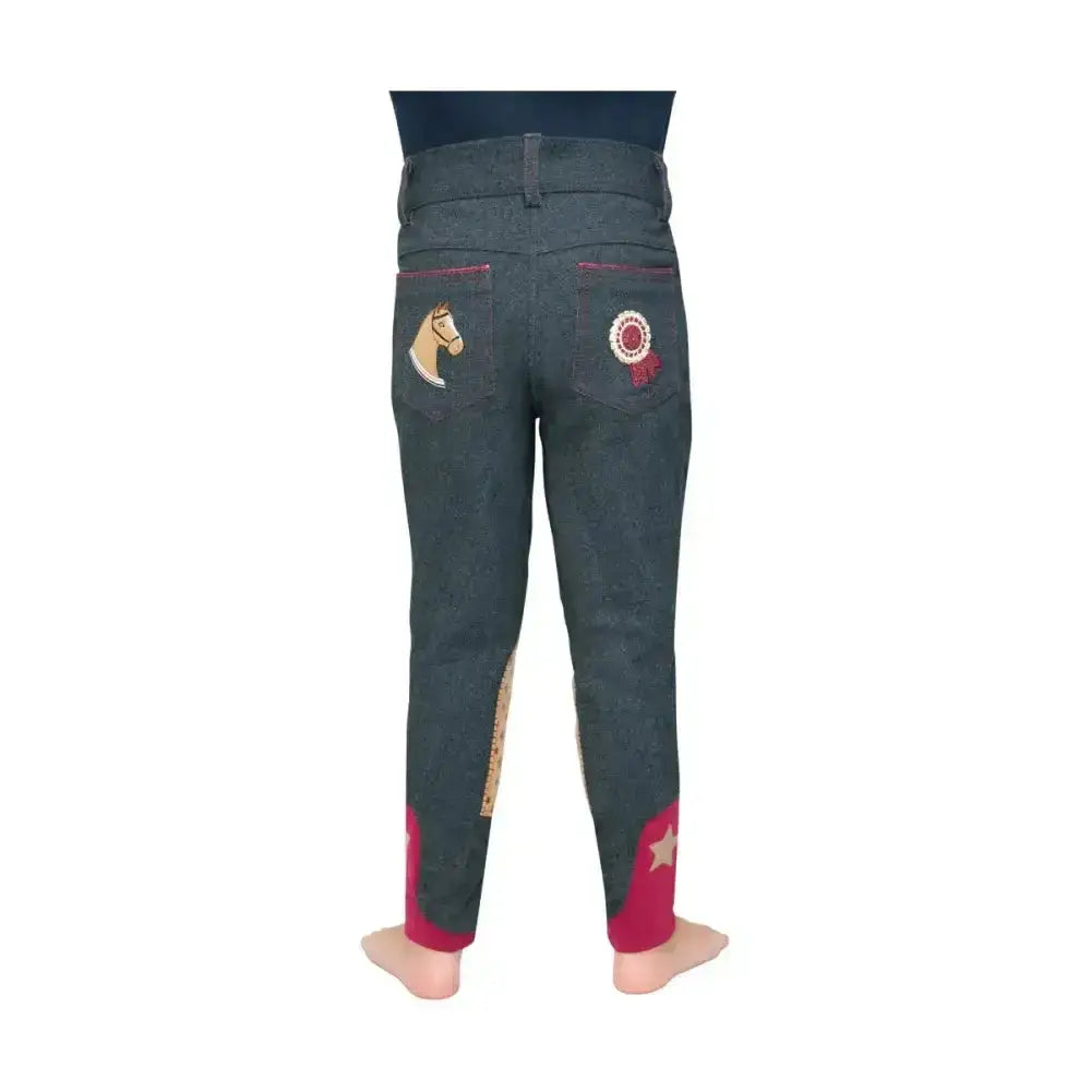 Back view of dark gray riding star collection denim jodhpurs with embroidered horse patches and magenta cuffs by little rider