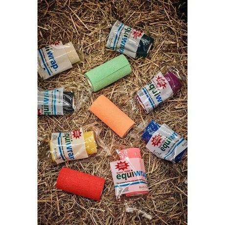 Colorful cohesive stretch bandage rolls in green orange pink and red from robinsons healthcare equiwrap 24 pack
