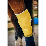Bright yellow robinsons healthcare equiwrap bandage with white trim for horse leg support vet wrap robinsons