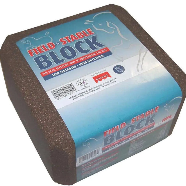 Brown textured field and stable block mineral lick with blue and white pockies label for livestock use