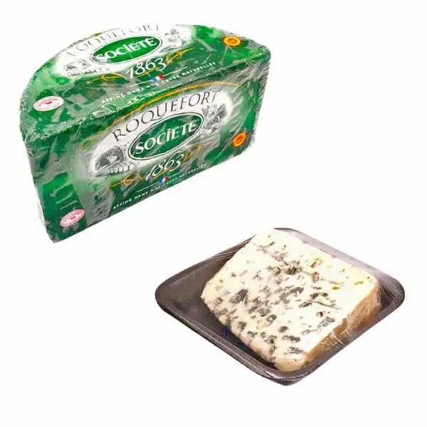 Green wrapped roquefort sheep’s blue cheese wedge with blue veining and herbs from local dairy farms and sharpham brie