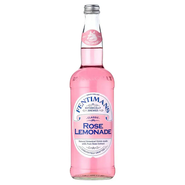 A clear glass bottle of fentimans rose lemonade filled with vibrant pink liquid and sealed with a silver cap