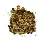 A pile of rowen barbary pro ultra animal feed with yellow brown pellets dark green calcareous marine algae pieces