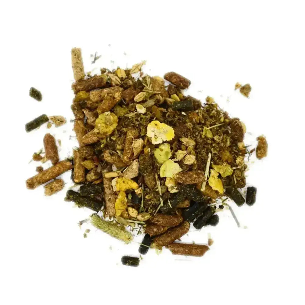 A pile of brown green and black pelletized rowen barbary senior feed mixed with dried herbs and yellow flower petals for joint health