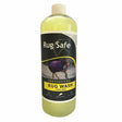A clear plastic bottle of rugsafe citrus zing antibacterial rug wash with pale yellow liquid and black yellow label