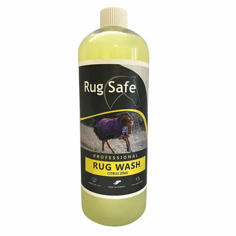 A clear plastic bottle of rugsafe citrus zing antibacterial rug wash with pale yellow liquid and horse branding