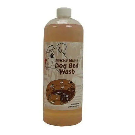 A clear plastic bottle of amber mucky mutts dog bed wash by rugsafe mucky mutts suitable for waterproof coatings
