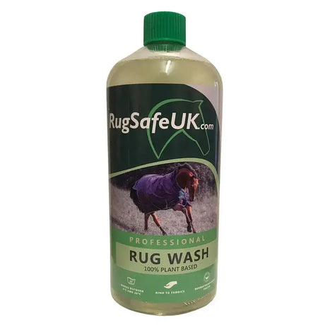 A clear plastic bottle of rugsafe rug wash plant-based liquid with green cap and built-in antibacterial properties