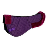 Purple quilted rhinegold comfort saddle half pad with plush maroon fleece edges and small purple ribbon tab