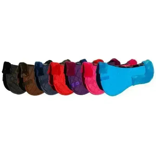 A row of colorful rhinegold comfort saddle half pads in cotton featuring black brown navy red purple pink and bright cyan hues